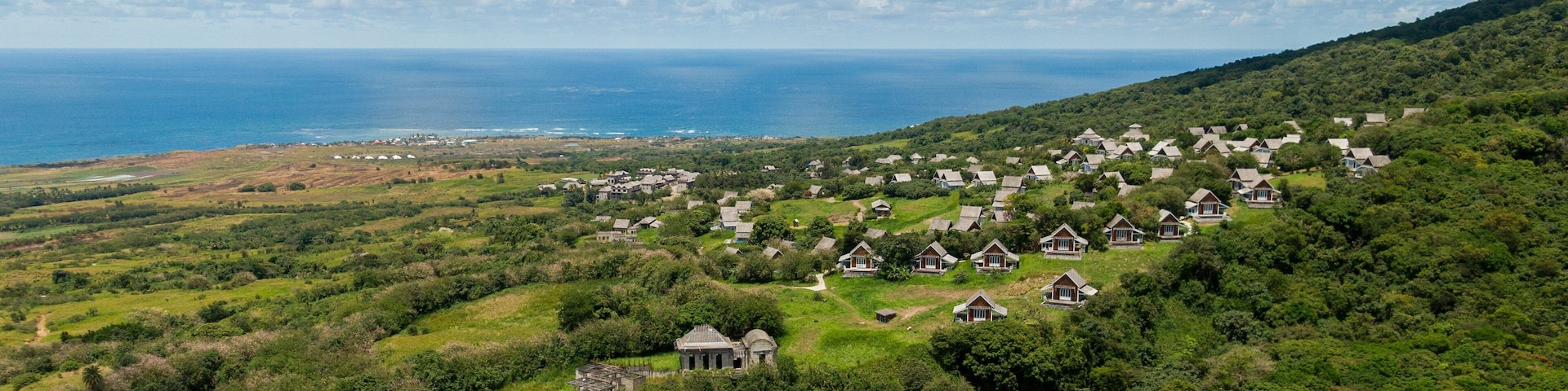 Saint Pauls which includes tranquil scenes, a small town or village and general coastal views