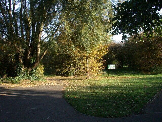 Entrance to Bramblefields local nature reserve "At the turn of the 20th Century this region was fen and farmland. More recently it was used as allotments but these were abandoned after poor yields. Today Bramblefields provides an idyllic haven for wildlife and people in the midst of a residential area. Local Nature Reserve status has helped safeguard the site from future development and with it a commitment to protecting its wildlife and community value."-From the Welcome notice.