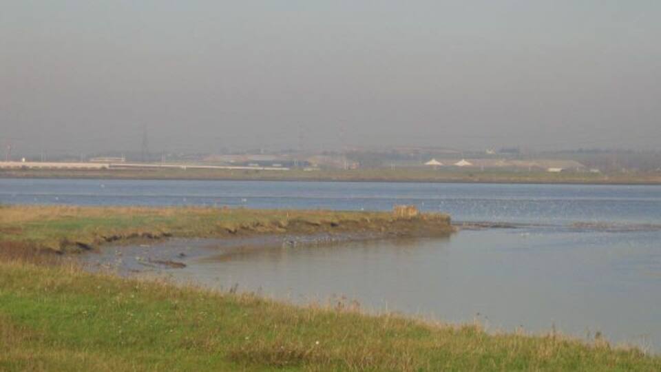 Confluence 2. There can be few grid squares with two river confluences in opposite corners! Across the Thames from the confluence submitted by Glyn, this is the mouth of the Darent (from which Dartford gets its name) looking across to Purfleet.