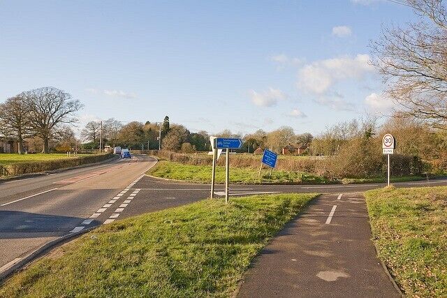 Junction of Bury Lane with Marchwood Road Bury Lane (right) goes to the village of Eling.