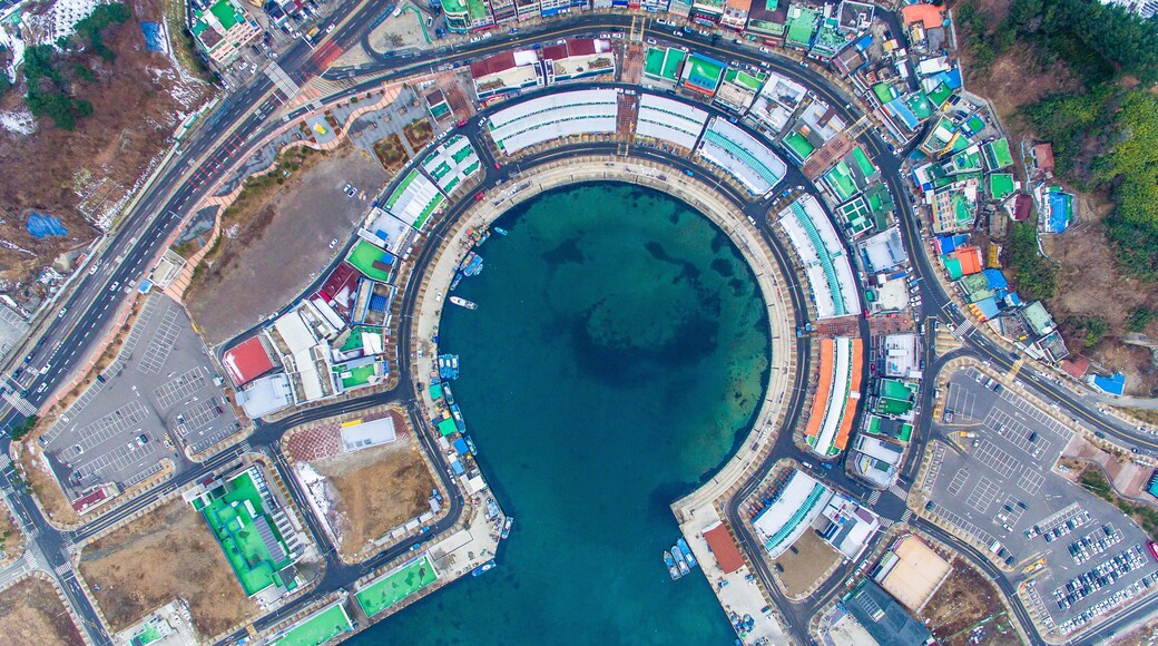 Sokcho, South Korea, 2016 - Sokcho Fish Town. View from above. Round bay of the sea city of Sokcho. Fish breaks are around the sea area.