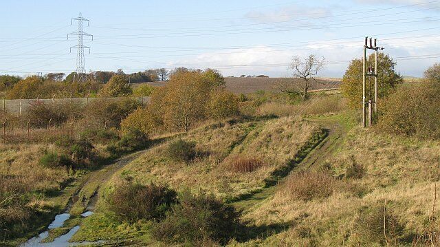 Waste ground by the power station site Between the old railway, now NCN 1, and the demolished power station. Appears to be popular with scramblers.