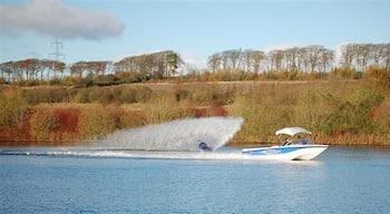 Water skier This water skier is honing his skills at the Scottish National Water Ski Centre on Townhill Loch near Dunfermline. http://www.waterskiscotland.co.uk/