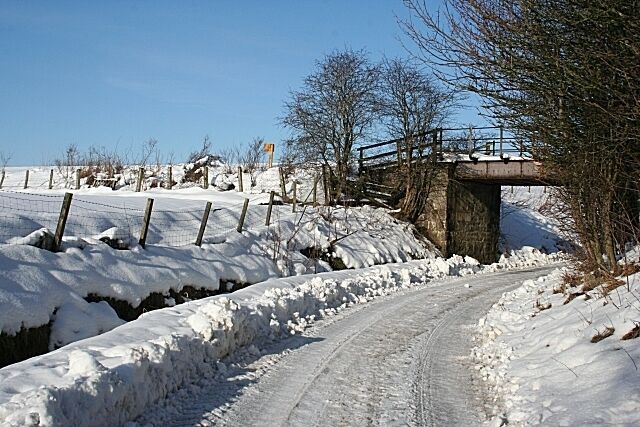 Railway Bridge This utilitarian bridge carries the Keith to Dufftown railway line over the access to Fife Cottage.