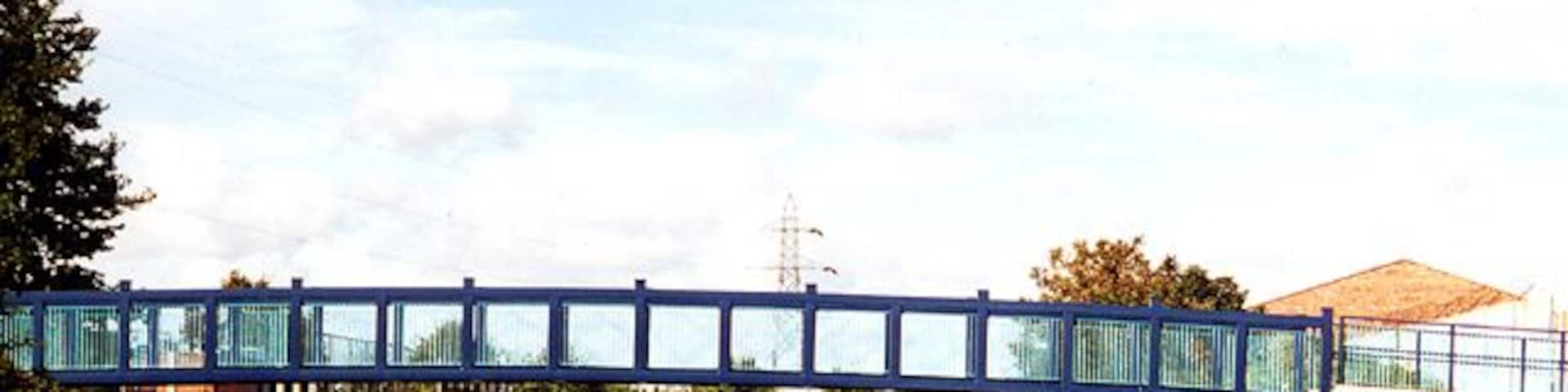 Footbridge Leeds & Liverpool Canal Modern footbridge over the Leeds and Liverpool canal at Litherland.