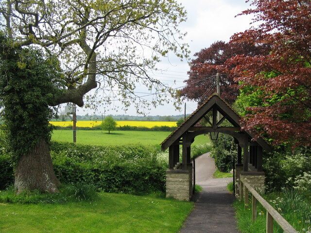 The lychgate at St. Nicholas, Silton. A view looking west out of the graveyard to the lychgate at St. Nicholas church, Silton.