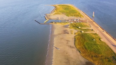 Panorama aerial view famous Texas City Dike, a levee that projects nearly 5miles south-east into mouth of Galveston Bay. It was designed to reduce the impact of sediment accumulation along lower Bay