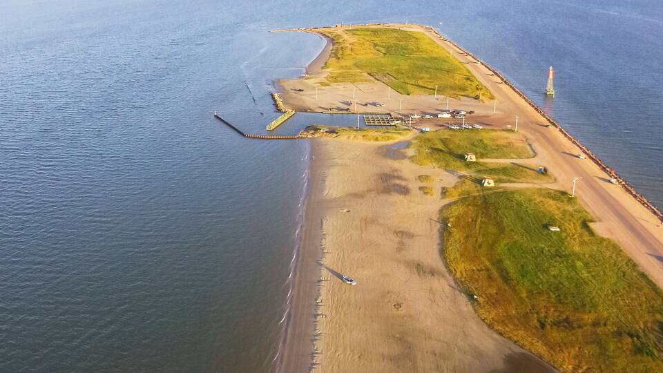 Panorama aerial view famous Texas City Dike, a levee that projects nearly 5miles south-east into mouth of Galveston Bay. It was designed to reduce the impact of sediment accumulation along lower Bay