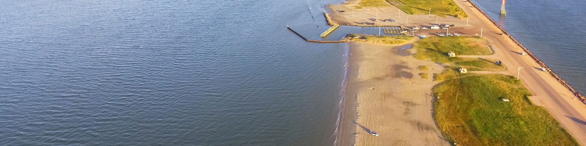 Panorama aerial view famous Texas City Dike, a levee that projects nearly 5miles south-east into mouth of Galveston Bay. It was designed to reduce the impact of sediment accumulation along lower Bay