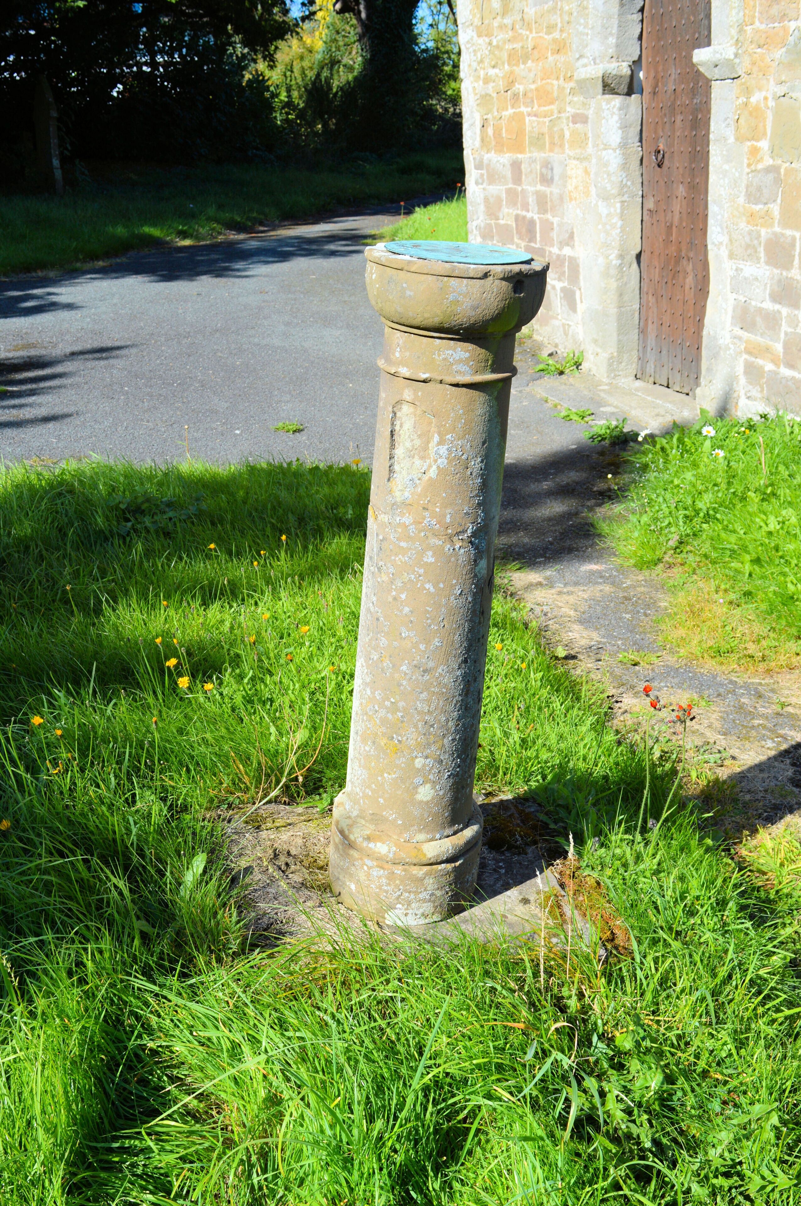 Photograph of the sundial in the churchyard of St Michael's Church, Edgton, Shropshire, England