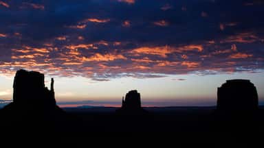 A sunset over rock formations.