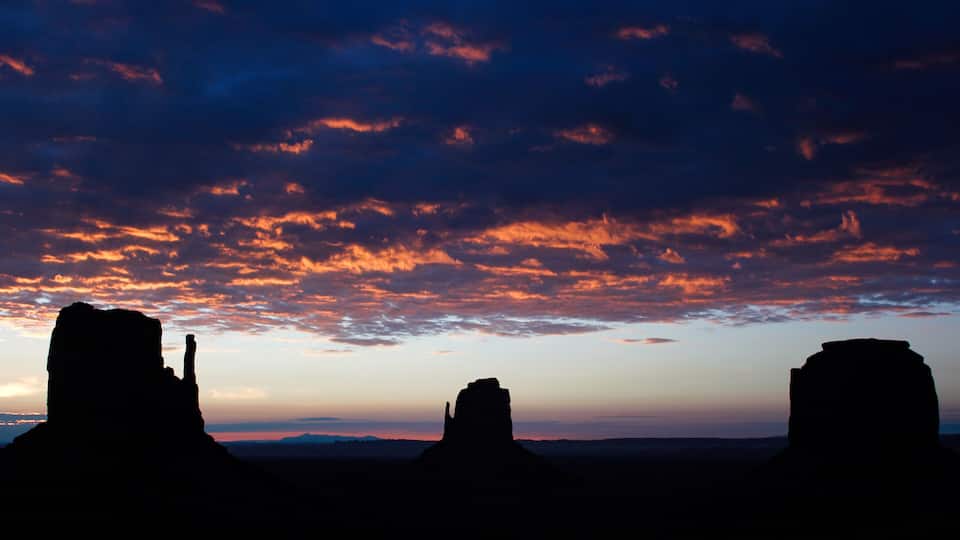 A sunset over rock formations.