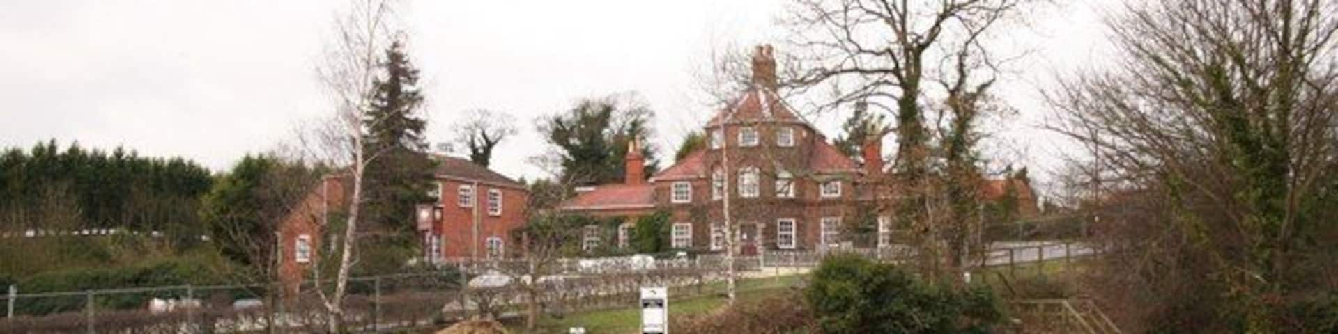 Drakeholes Moorings on the Chesterfield Canal at Drakeholes with the White Swan (formerly the Griff Inn) behind