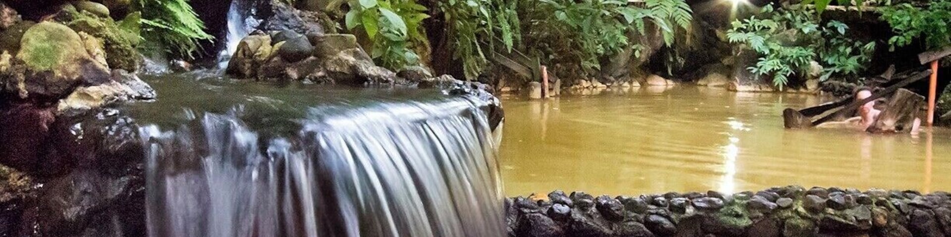 The sulfur pools at Screw's blend in with the surrounding rain forest.  The hottest pools at the top are fed by by cool waterfalls, so you can keep a cool head while soothing the muscles below.  Great way to wind.
Tip: The owner loves his reggae music, so don't expect the tranquil sounds of falling water and chirping birds.  It's all fun though, and adds to the Caribbean flavor.