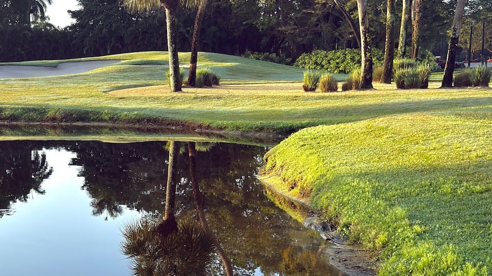 Gorgeous grounds at Boca West. Golf course, lake, manicured greens. Perfect for a round of golfing among a scenic, beautifully landscaped background. Robust, exceptional modern luxury amenities.