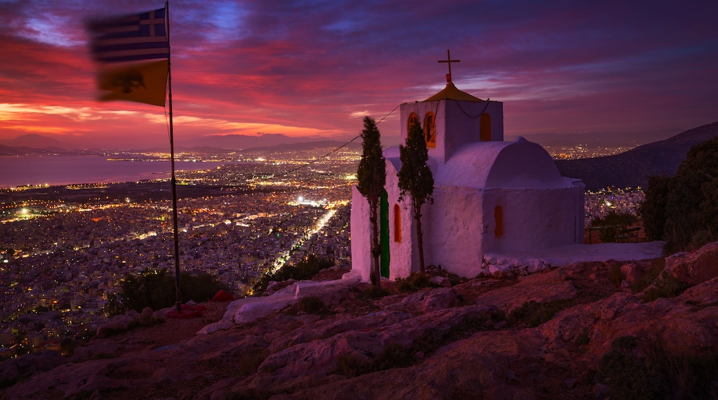 Prophetess Ilias church and view of Athens at dusk.
