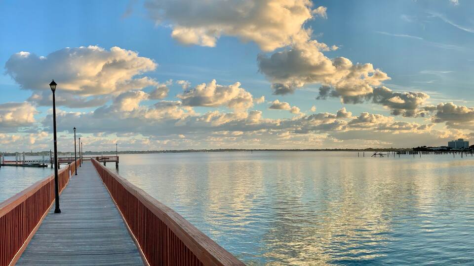 Sunrise on the river along the boardwalk in Stuart, Florida, United States