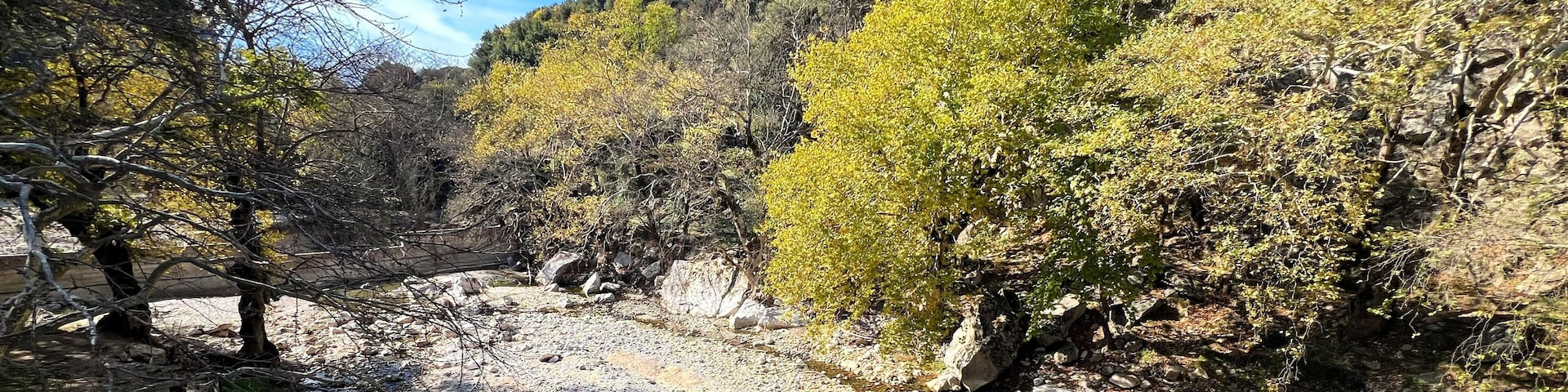 Scenic view of the Portaikos River from Portaikos Bridge, nestled in the beautiful Meteora-Pyli Geopark in Trikala, Thessaly, Greece’s newest addition to the UNESCO Global Geoparks.