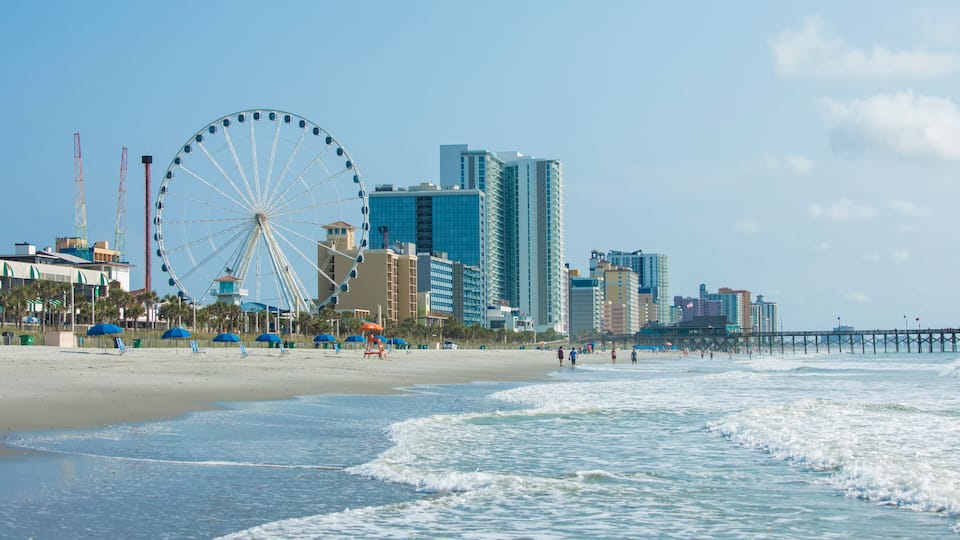Resorts, ocean, and ferris wheel in Myrtle Beach, South Carolina.