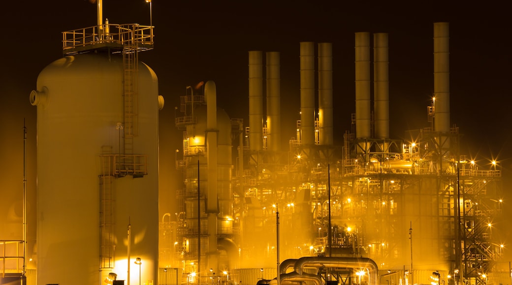 Oil refinery industrial plant at night