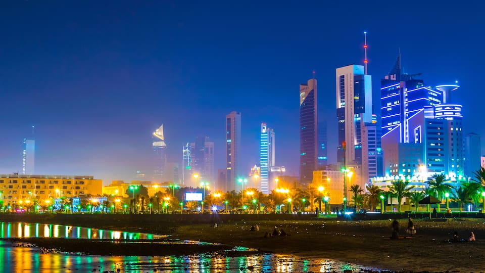 Skyline of Kuwait during night including the Seif palace and the National assembly building.