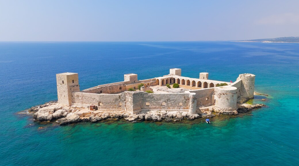 Kizkalesi, Mersin, Turkey. Maiden Castle island fortress completely surrounded by water, medieval architecture in mediterranean sea.. Aerial View