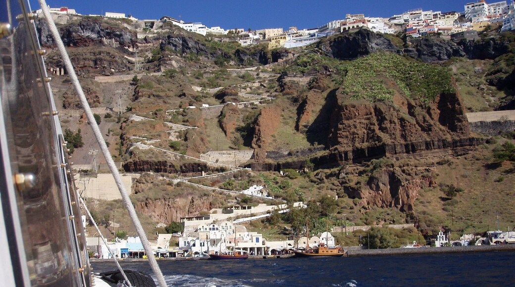 Grabbed this shot taking the ferry from the port of Santorini to an Island close by. That zig zag path you see is how you in the old days got to the town of Fira, They now have a cable car. But if you care for the hike, there are 588 stairs and takes a couple hours! Great view, love this place! just watch out for the donkey doo... you'll see. Enjoy