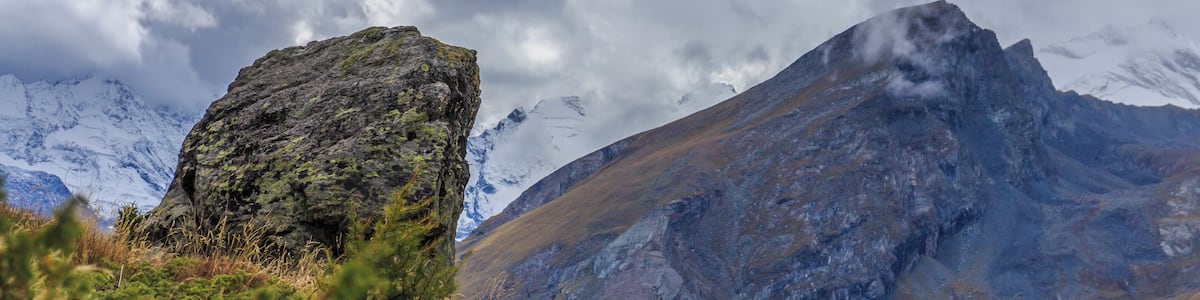 Mountain hike of Gimillan (1805m.) At Colle Tsa Sètse Cogne Valley (Italy). View large detached rock.