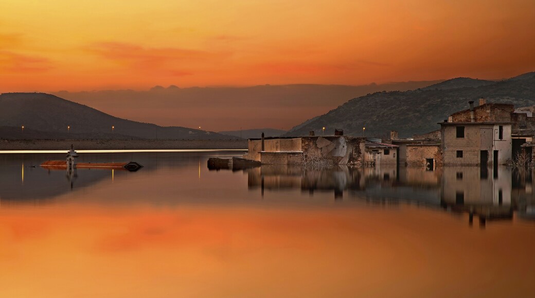 CRETE ISLAND, GREECE. Sunset at Sfendyli, the "sinking" village in the artificial lake created by the dam of Aposelemis, Hersonissos municipality, Heraklion prefecture.