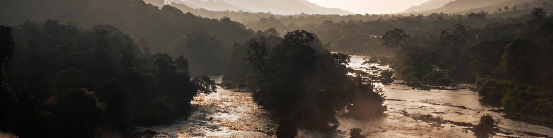 Majestic Athirappilly Falls Panorama in Kerala, India. Panoramic view of the majestic Athirappilly Falls, often called 'The Niagara of India,' located in the rainforests of Kerala's Western Ghats.