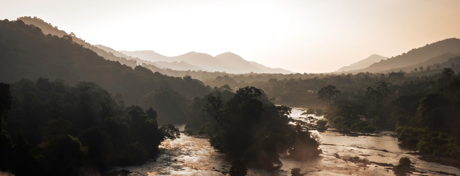Majestic Athirappilly Falls Panorama in Kerala, India. Panoramic view of the majestic Athirappilly Falls, often called 'The Niagara of India,' located in the rainforests of Kerala's Western Ghats.
