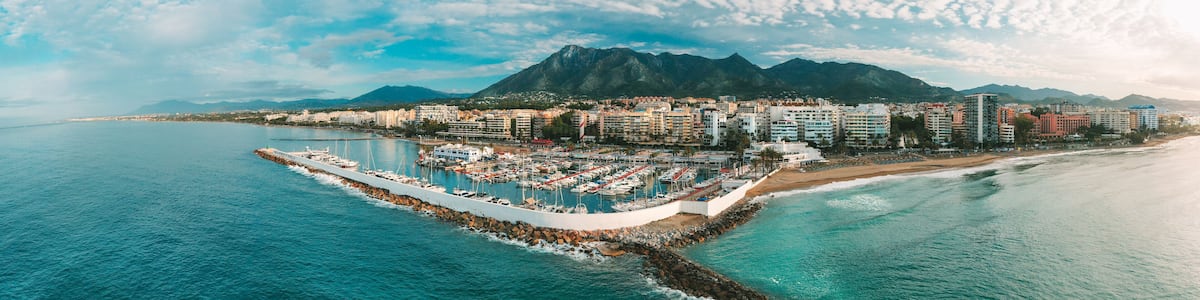Aerial panoramic view of Puerto Banus marina with luxury yachts, Marbella, Spain