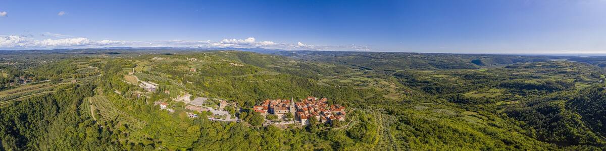 Aerial panoramic drone picture of the medieval town of Groznjan on the Istrian peninsula during daytime