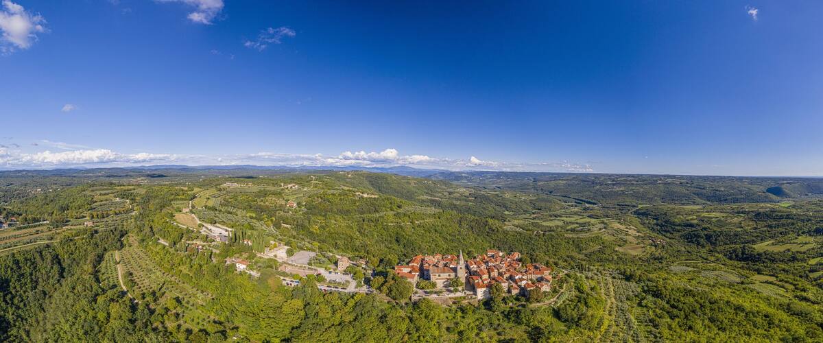 Aerial panoramic drone picture of the medieval town of Groznjan on the Istrian peninsula during daytime