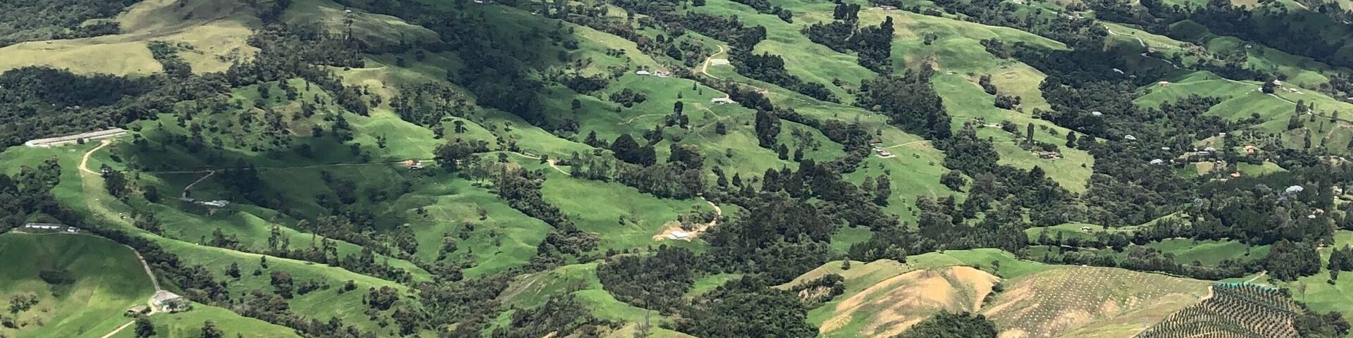 View from the sky doing tandem paragliding near Medellín