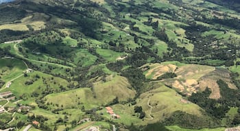 View from the sky doing tandem paragliding near Medellín