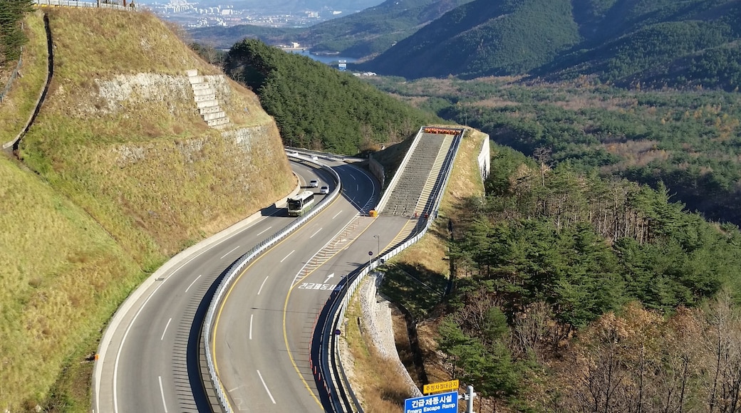 Emergency escape ramp on Misiryeong Penetrating Road, located at the middle of a downhill before Tollgate. The deep, loose gravel on the ramp allows vehicles that are having braking problems to stop safely.
