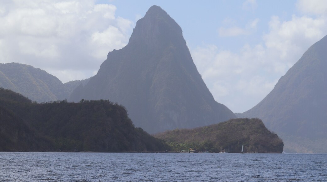 Recently I visited the volcanic island of Saint Lucia and it was truly as wonderful to look at as the people who live there. There is so much to do and see that a week just wasn't enough time. On this excursion I went on a catamaran to The Piton. There is Grand Piton and Petit Piton. Both are 'hikable' but only 1 of the 2 is considered safe to do so. It's about a 3 hr hike to the top for experienced hikers so plan for a full day here. I recommend making it near the end of your trip vs the start or you will spend your vacation very very sore :) At the top you will be greeted with incredible views of the island so bring a camera.
#SaintLucia #WestIndies #Piton #Carribean #IslandLife #Island #Mountain.