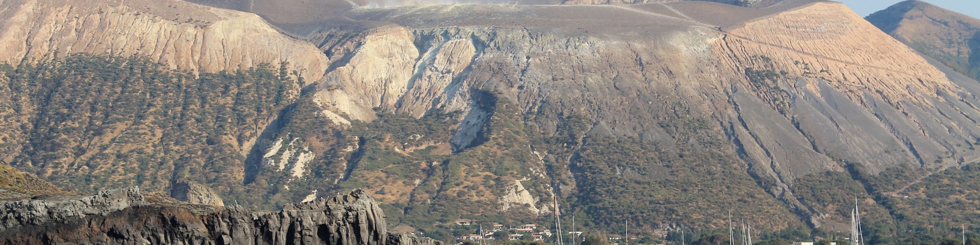 Sailing toward Porto di Ponente , along the coast of Vulcanello