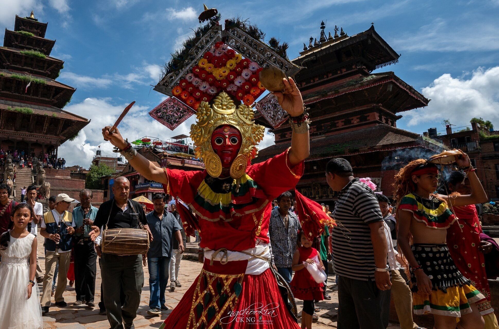 Gai Jatra Festival 神牛节-Bhaktapur Nepal 
傳說在公元16世紀馬拉王朝時期，尼泊爾國王幼子因病去世，王妃整日茶飯不進，傷心流淚。國王為了安慰王妃，舉辦了這個節日——在同一年家裡有多少人過世的，就派相同的人數領著黃牛（一隻裝扮好的牛就代表有一位家人去世，以此類推）來參加這活動。國王是想讓王妃明白: 看，不是只有你失去了兒子，這麼多人都失去了他們的親人。在裝扮的神牛繞城遊行一圈之後，國王繼續命令人們在臉上畫上五色臉譜，載歌載舞，以證明生老病死沒有那麼可怕,王妃終於釋懷微笑，這就是神牛節的由來。