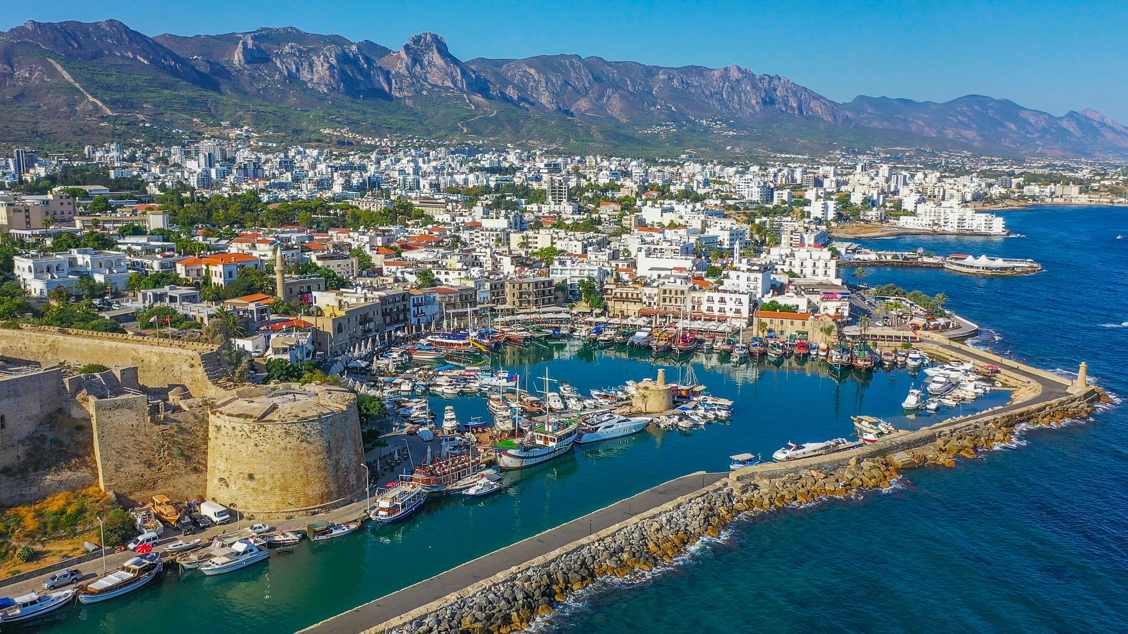 Kyrenia (Girne) is a city on the north coast of Cyprus, known for its cobblestoned old town and horseshoe-shaped harbor.