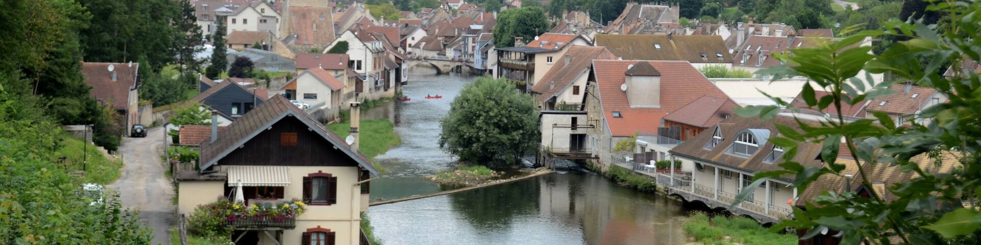 Overview of the village Ornans along the Loueriver in the French Jura