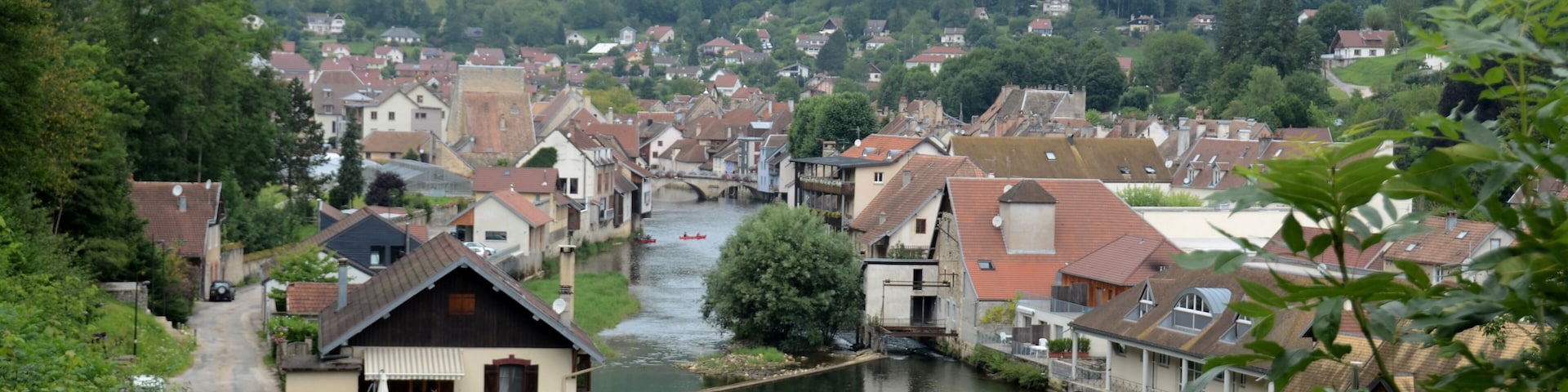 Overview of the village Ornans along the Loueriver in the French Jura