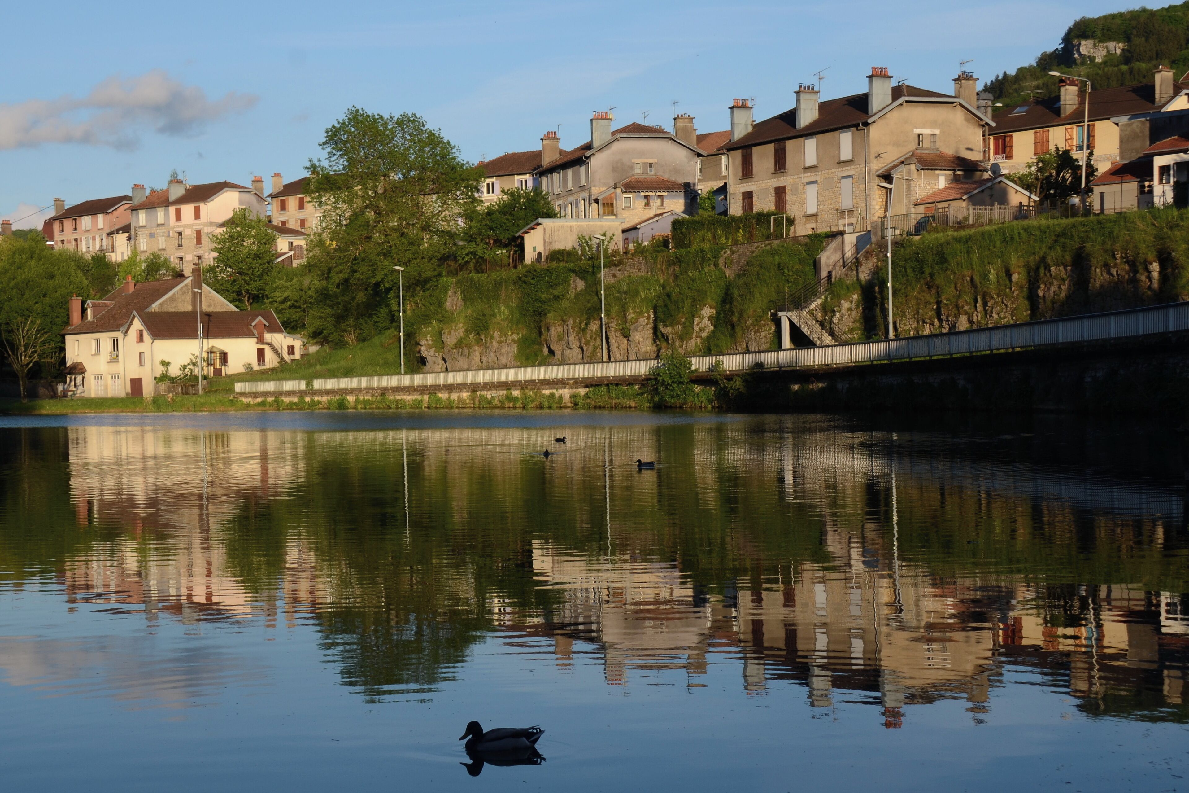 Le Miroir (the mirror) of Ornans with reflections of the houses in the Loue river