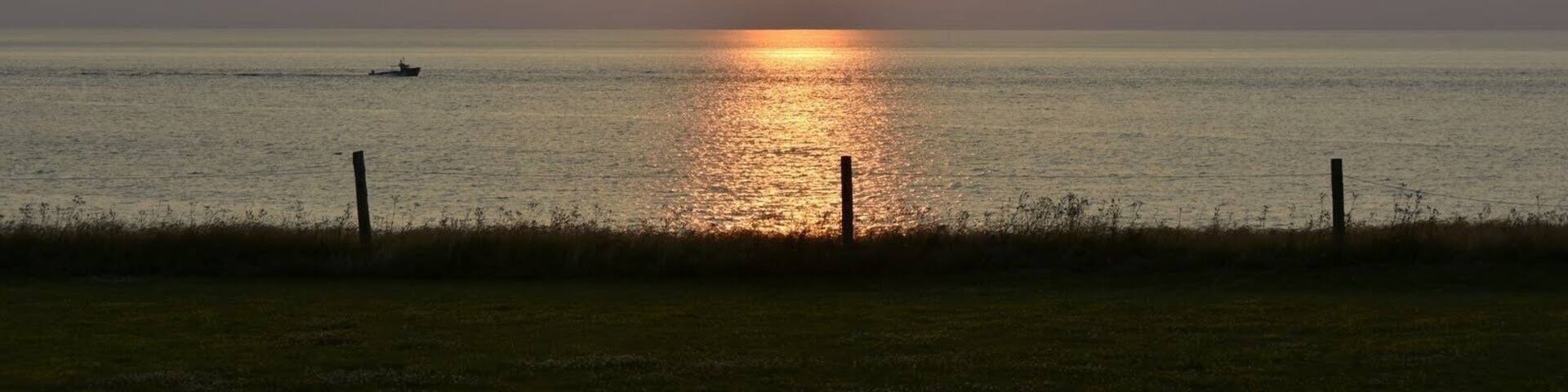 Lobster boat at sunset.
