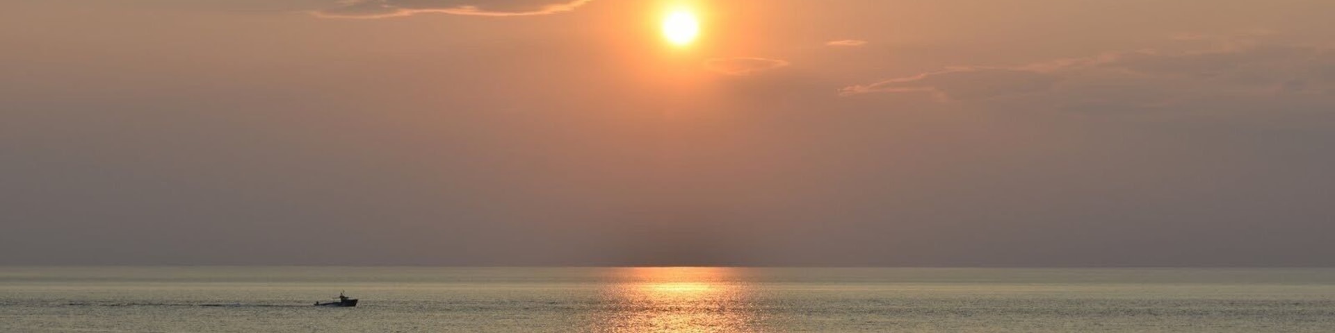 Lobster boat at sunset.