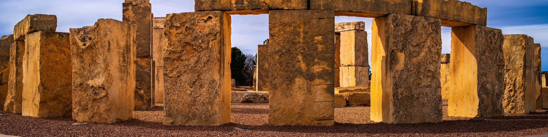 Ancient stone ruins with a clear sky.