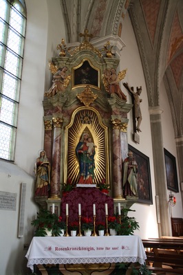 Italy, South Tirol, Wiesen, Pfitscherstraße, Pfarrkirche Hl. Kreuz. The church is mentioned for the first time in a written document in 1337 and it is reported that has been consecrated once in 1434. The present church has a massive bell tower and was built with blocks of granite under the supervision of Adam Schaiter of Sterzing in Late Gothic and Renaissance style. In the 19th century was restored freeding the interior by the Gothic elements. The ceiling frescoes are by Josef Renzler dating from 1841.