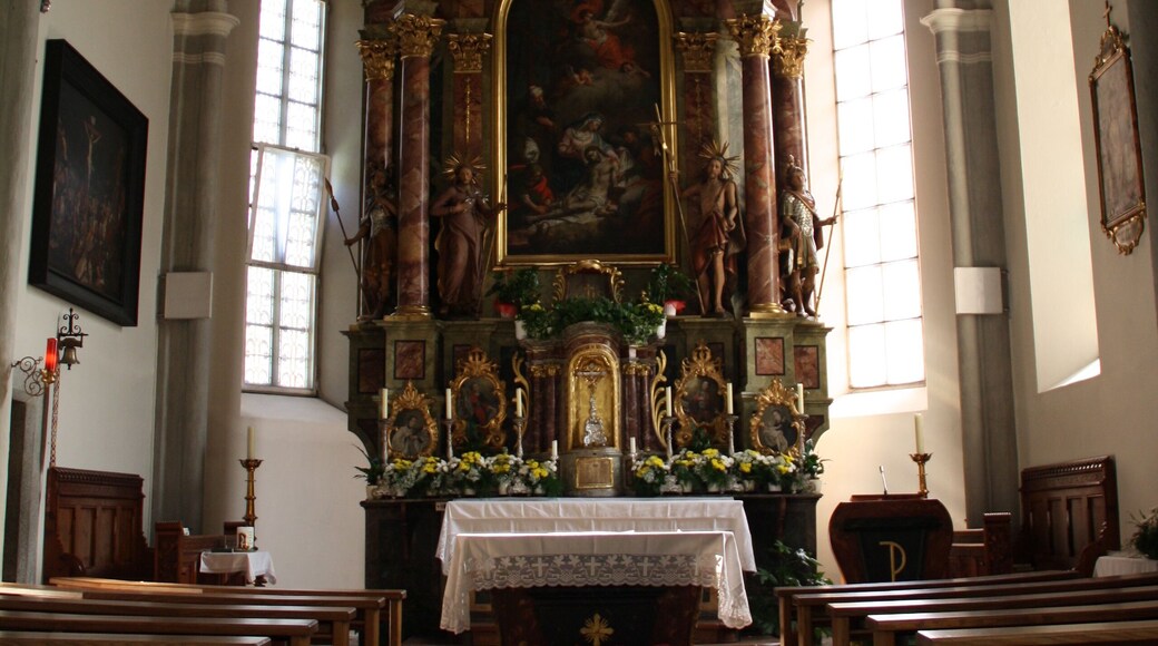 Italy, South Tirol, Wiesen, Pfitscherstraße, Pfarrkirche Hl. Kreuz. The church is mentioned for the first time in a written document in 1337 and it is reported that has been consecrated once in 1434. The present church has a massive bell tower and was built with blocks of granite under the supervision of Adam Schaiter of Sterzing in Late Gothic and Renaissance style. In the 19th century was restored freeding the interior by the Gothic elements. The ceiling frescoes are by Josef Renzler dating from 1841.