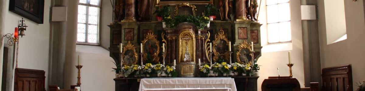 Italy, South Tirol, Wiesen, Pfitscherstraße, Pfarrkirche Hl. Kreuz. The church is mentioned for the first time in a written document in 1337 and it is reported that has been consecrated once in 1434. The present church has a massive bell tower and was built with blocks of granite under the supervision of Adam Schaiter of Sterzing in Late Gothic and Renaissance style. In the 19th century was restored freeding the interior by the Gothic elements. The ceiling frescoes are by Josef Renzler dating from 1841.